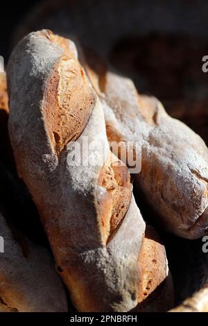 Freshly baked bread in a traditional french bakery.  France. Stock Photo