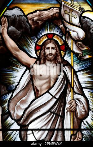 Song Vinh Church. Stained glass.  The resurrection of Jesus Christ on the third day  after his crucifixion.  Vietnam. Stock Photo