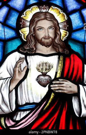 Song Vinh Church. Stained glass.  The Sacred Heart of Jesus. Vietnam. Stock Photo