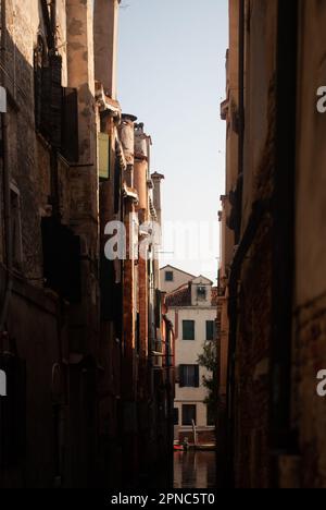 View on atmospheric street with sunlight in old town Stock Photo