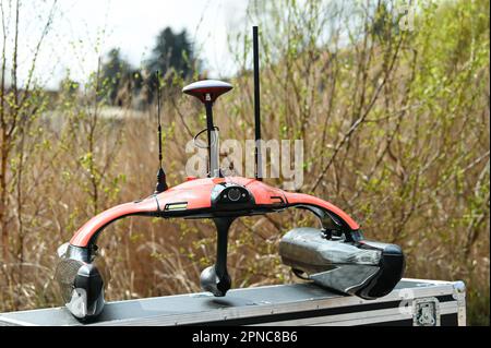 Aseleben, Germany. 18th Apr, 2023. The Sonobot floating drone can independently scan and display the lake bottom using sonar. This modern technology is being used for the first time in the search for underwater archaeological treasures on the bottom of Lake Suess. Credit: Heiko Rebsch/dpa/Alamy Live News Stock Photo