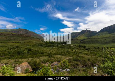 Green foothills in front of the mountain Drakensberg South Africa Stock Photo