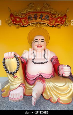 Phu Son Tu buddhist temple.  Smiling Buddha or big happy Maitreya Buddha statue. Tan Chau. Vietnam. Stock Photo