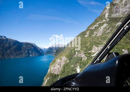 Approaching Milford airport by helicopter, South Island, New Zealand. Stock Photo