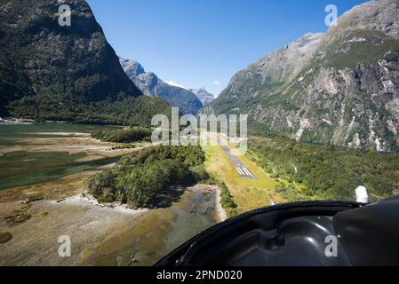 Approaching Milford airport by helicopter, South Island, New Zealand. Stock Photo