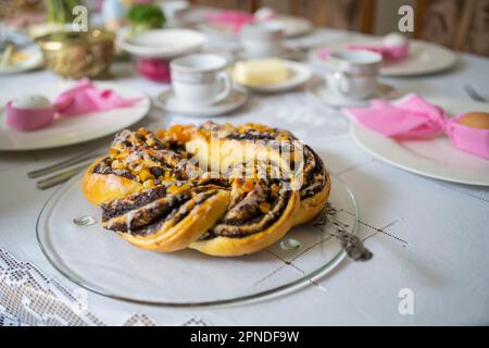 Fresh Cakes Pastries at Easter Holidays Table Stock Photo