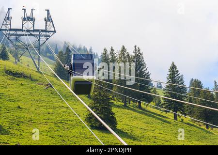 Gondola of Stanserhorn cabrio cable car to Stanserhorn mountain in Switzerland Stock Photo