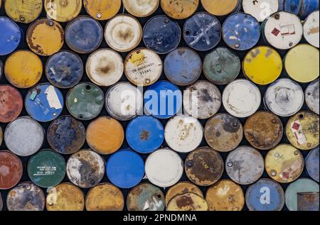 Stack of oil drums in an industrial yard Stock Photo