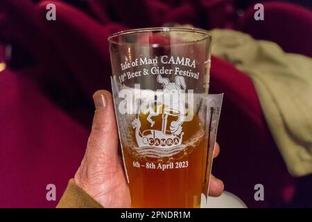 A printed glass with beer at the Campaign for Real Ale (CAMRA) Isle of Man Beer Festival, 2023, Villa Marina, Douglas, Isle of Man