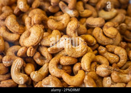 Pile of roasted Cashew nuts, closup Stock Photo