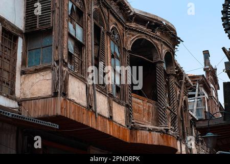 Historic wooden facade of a building ruin in old town of Damascus, Syria Stock Photo