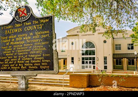 A historic marker stands in front of the Baldwin County Courthouse, April 16, 2023, in Bay Minette, Alabama. Stock Photo