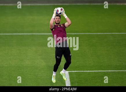 Derby County goalkeeper Joe Wildsmith warming up ahead of the Sky Bet League One match at St James Park, Exeter. Picture date: Tuesday April 18, 2023. Stock Photo