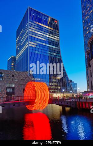 The 'Clew' artwork by Ottotto on Cubitt bridge, Canary Wharf, London, United Kingdom. Commissioned for the Canary Wharf Winter Lights festival 2020. Stock Photo