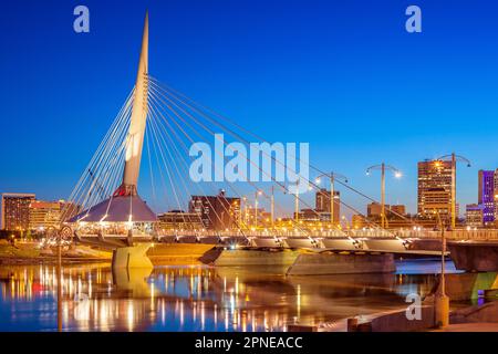 Skyline of downtown Winnipeg with the Provencher Bridge and the Red River, Manitoba, Canada. Stock Photo