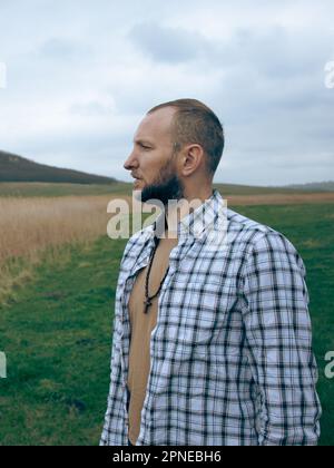 Portrait photo of a man in the countryside Stock Photo