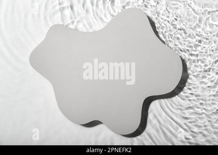 Plaster podium in water on white background Stock Photo