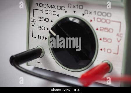 Close up of  a voltmeter commutator. Analog multimeter panel.DC voltage level. Stock Photo