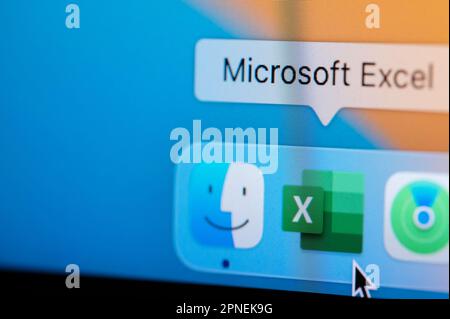New york, USA - April 12, 2023: Open Microsoft office excel app in macbook dock to create data base on computer screen close up view Stock Photo