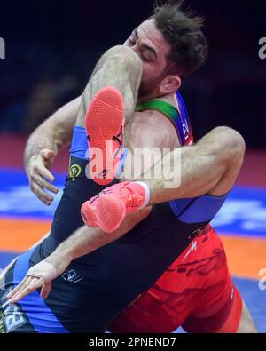 CROATIA – APRIL 18: Haji Aliyev of Azerbijan  (red) competes against Ramazan Eldarovitch Ramazanov of Bulgaria  (blue) during Men's Freestyle 70 kg weight Senior European Wrestling Championship gold medal match on April 18, 2023, at Arena Zagreb in Zagreb, Croatia. Photo: Igor Soban/PIXSELL Stock Photo