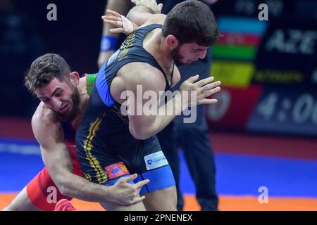 CROATIA – APRIL 18: Haji Aliyev of Azerbijan  (red) competes against Ramazan Eldarovitch Ramazanov of Bulgaria  (blue) during Men's Freestyle 70 kg weight Senior European Wrestling Championship gold medal match on April 18, 2023, at Arena Zagreb in Zagreb, Croatia. Photo: Igor Soban/PIXSELL Stock Photo