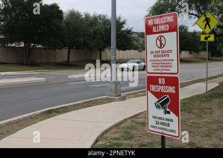 San Antonio, USA. 18th Apr, 2023. No trespassing, under surveillance and no soliciting allowed signs on a through street adjacent to HOA communities in San Antonio, Texas, USA, on April 18, 2023. There are 355,000 homeowner association communities in the United States and about 8,000 new HOA communities are developed each year. (Photo by Carlos Kosienski/Sipa USA) Credit: Sipa USA/Alamy Live News Stock Photo
