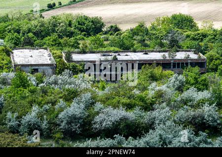 Ruins of an old Cold War military barracks from above in Hungary Stock Photo