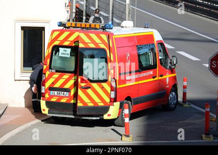 Monte-Carlo, Monaco - April 16, 2023: Rear view of a red Renault Master fire brigade van from France, in action with open doors, responding to an emer Stock Photo