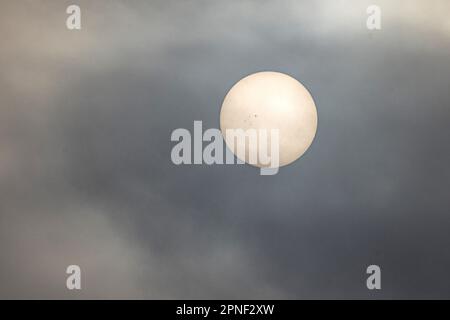 fog in front of the sun with visible sunspots, Germany, Bavaria Stock Photo