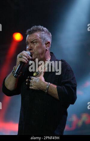 Jimmy Barnes Cold Chisel performing live in concert at ANZ Stadium as part of the Sydney 500 V8 Supercars event. Sydney, Australia - 05.12.09 Stock Photo