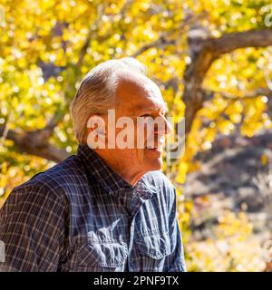 Senior man smiling and posing in Zion National Park Stock Photo