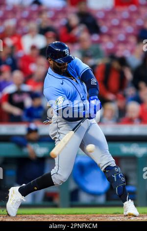 Tampa Bay Rays' Yandy Diaz steps into the batters box, wearing a rainbow  arm band as the Rays celebrate Pride day, during a baseball game against  the Texas Rangers Saturday, June 10