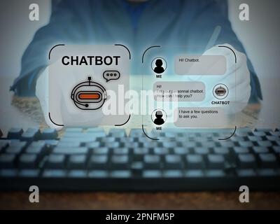 A man uses a digital chatbot computer program to conduct an online chat conversation and provide information on the internet network. AI artificial te Stock Photo