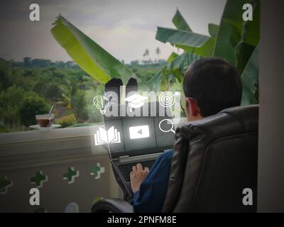 E-learning education concept, learning from anywhere, video tutorial, internet lessons, webinar, and online courses. Stock Photo