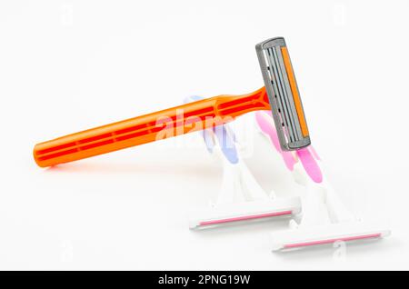 Disposable shaving razor on white background Stock Photo