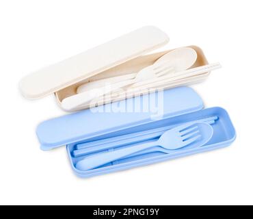 Plastic spoons, forks and chopsticks set isolated on white background. Saved clipping path. Stock Photo