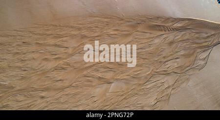 Shapes created by water in the sand, Praia de porto mos, aerial view, Algarve, Portugal Stock Photo