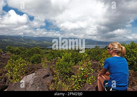 Woman looking at Lake Arenal, Guanacaste and Alajuela provinces, Costa Rica Stock Photo
