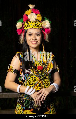 Exquisite elegance in traditional attire: A Borneo lady showcasing the beauty of her culture through her stunning traditional clothing Stock Photo