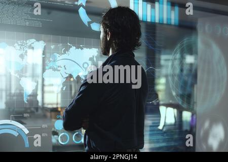 Monitor hologram, business man and data analytics for global networking, worldwide technology or digital software.. Holographic screen of statistics Stock Photo