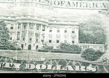partial view extreme macro closeup twenty dollar banknote bill showing part of the white house and word dollar as us american currency Stock Photo