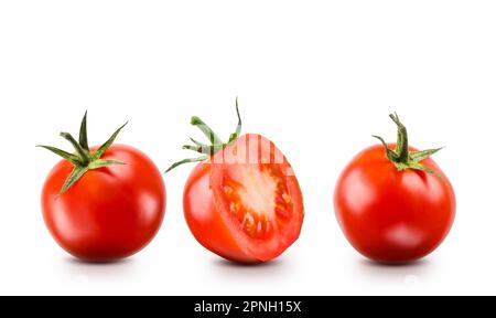 Small red cherry tomatoes on white background. Stock Photo