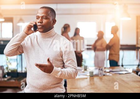 Business, focused man and phone call on cellphone in busy office for communication, networking and contact. Black male talking on smartphone for Stock Photo