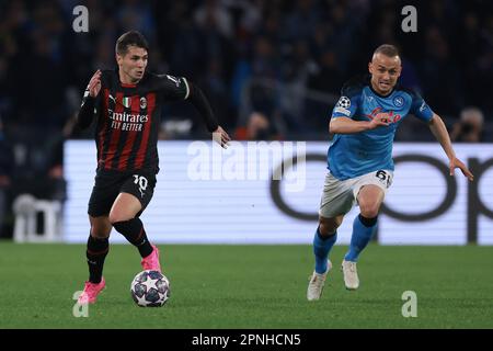 Naples, Italy, 18th April 2023. Brahim Diaz of AC Milan is pursued by Stanislav Lobotka of SSC Napoli during the UEFA Champions League match at Stadio Diego Armando Maradona, Naples. Picture credit should read: Jonathan Moscrop / Sportimage Stock Photo