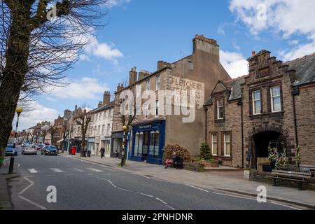 Quaint old buildings on Main Street in the town of Cockermouth, Cumberland, UK. Stock Photo