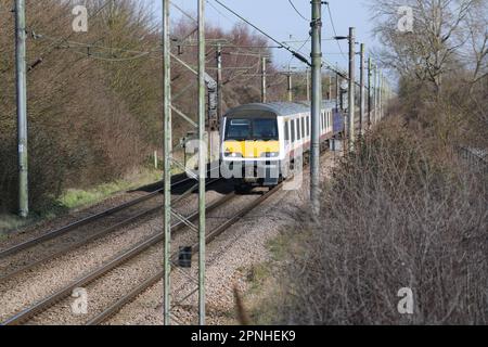 Greater Anglia Class 321 units in the Witham area on the Great Eastern mainline. Stock Photo