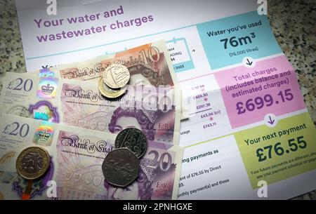 Increasing privatised water utility bills, supply, wastewater treatment charges, with cash notes and coins Stock Photo