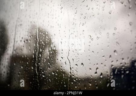 The glass of a window with natural raindrops (water drops) Stock Photo