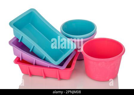 Several silicone molds for baking, macro, isolated on white background. Stock Photo