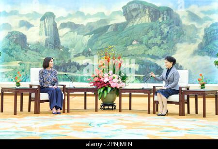 Beijing, China. 19th Apr, 2023. Peng Liyuan, wife of Chinese President Xi Jinping, meets with Sylvia Bongo Ondimba, wife of President of the Gabonese Republic Ali Bongo Ondimba, in Beijing, capital of China, April 19, 2023. Sylvia is accompanying Bongo on his state visit to China. Credit: Ding Lin/Xinhua/Alamy Live News Stock Photo